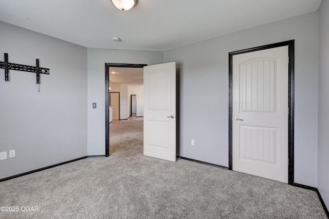 2036 S Ozark, Joplin, MO 64804 - unfurnished bedroom with light carpet and baseboards