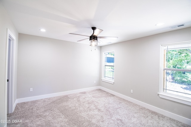 512 N Devon Ave, Webb City, MO 64870 - spare room featuring carpet flooring, a ceiling fan, and recessed lighting