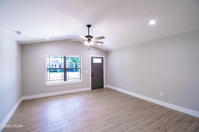 512 N Devon Ave, Webb City, MO 64870 - empty room with a ceiling fan, wood finished floors, lofted ceiling, and recessed lighting