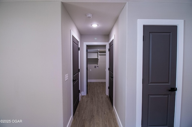512 N Devon Ave, Webb City, MO 64870 - hallway with wood finished floors and baseboards