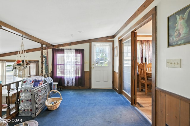 25327 Central Ave, Joplin, MO 64801 - entrance foyer featuring wainscoting, carpet, and wood walls