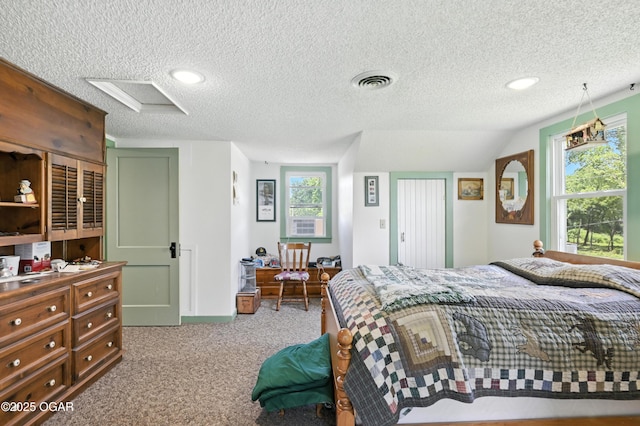 25327 Central Ave, Joplin, MO 64801 - carpeted bedroom featuring a textured ceiling, multiple windows, and recessed lighting
