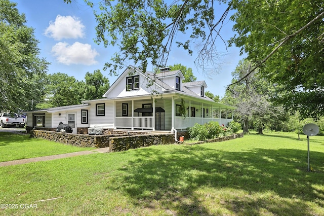25327 Central Ave, Joplin, MO 64801 - view of front of home featuring covered porch and a front lawn