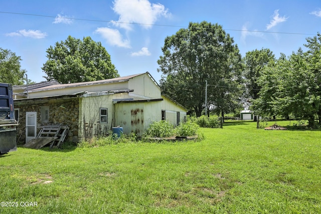 25327 Central Ave, Joplin, MO 64801 - view of green lawn with an outdoor structure