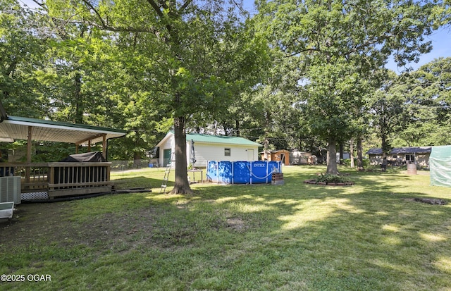 137 Lone Elm Dr, Carl Junction, MO 64834 - view of yard featuring an outdoor pool and a deck