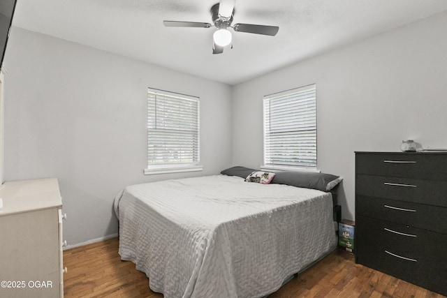 137 Lone Elm Dr, Carl Junction, MO 64834 - bedroom featuring dark wood-style flooring and a ceiling fan