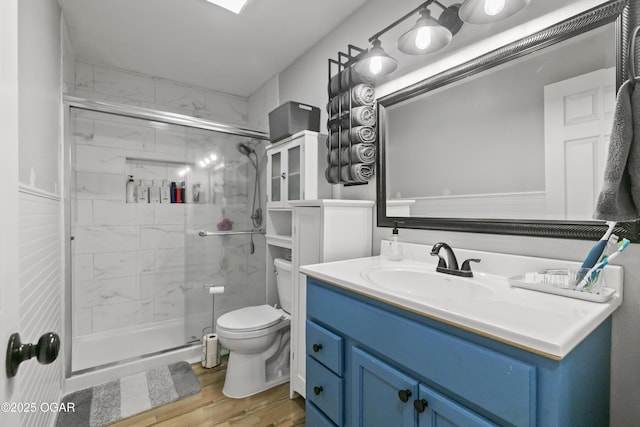 137 Lone Elm Dr, Carl Junction, MO 64834 - bathroom with a stall shower, vanity, and wood finished floors