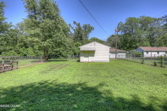 605 S Jefferson St, Webb City, MO 64870 - fenced backyard featuring an outbuilding