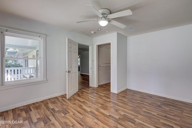 605 S Jefferson St, Webb City, MO 64870 - unfurnished room with wood finished floors and ceiling fan