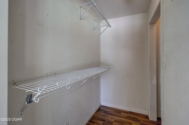 605 S Jefferson St, Webb City, MO 64870 - spacious closet featuring wood finished floors