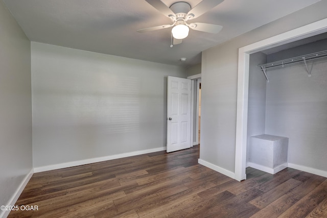 605 S Jefferson St, Webb City, MO 64870 - unfurnished bedroom with dark wood-type flooring, a closet, and a ceiling fan