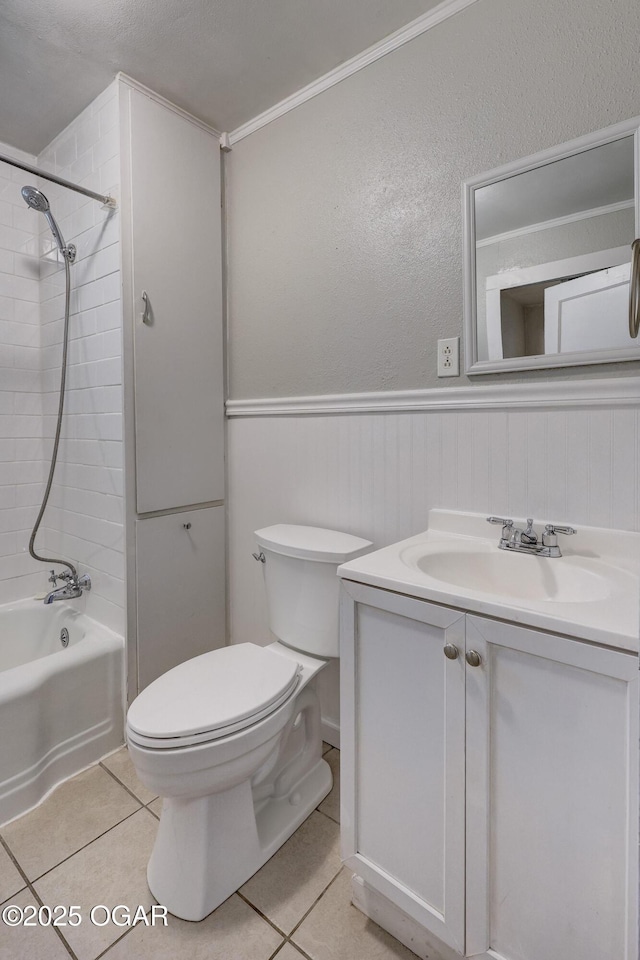 605 S Jefferson St, Webb City, MO 64870 - full bath with tile patterned floors, vanity, shower / bathtub combination, a wainscoted wall, and ornamental molding