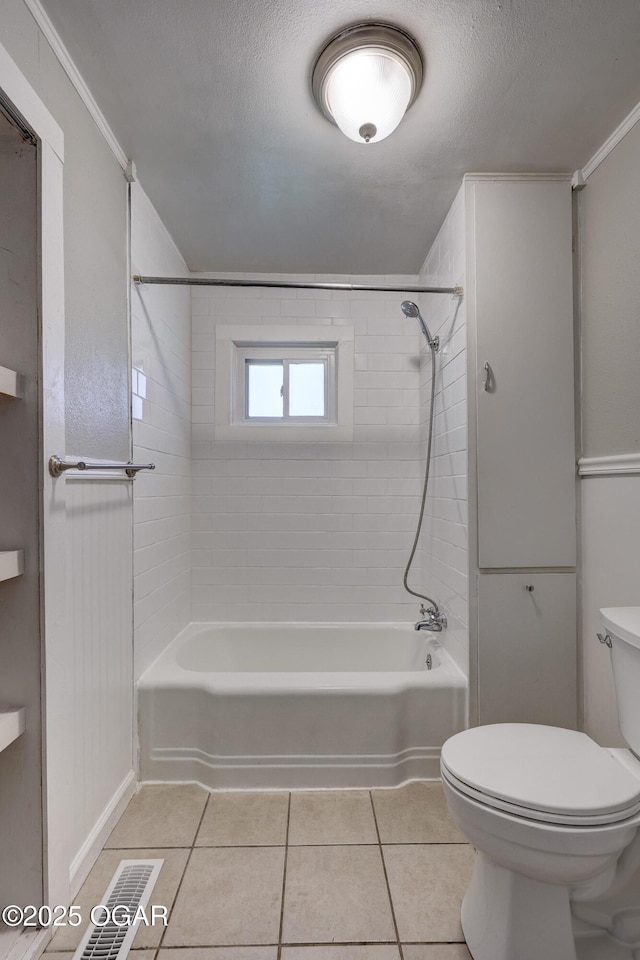 605 S Jefferson St, Webb City, MO 64870 - bathroom featuring tub / shower combination, tile patterned flooring, and a textured ceiling