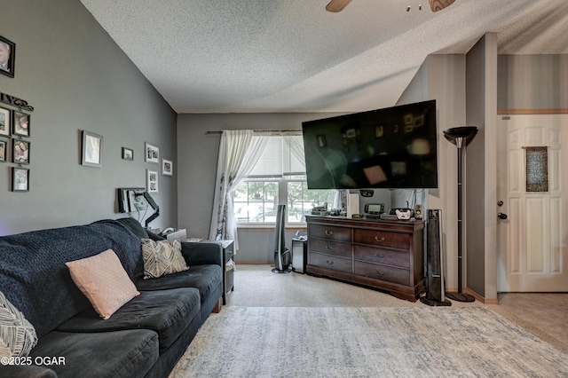 1501 Ryan Rd, Joplin, MO 64801 - carpeted living room with a textured ceiling and a ceiling fan
