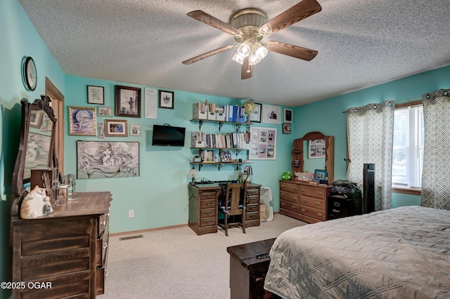 1501 Ryan Rd, Joplin, MO 64801 - bedroom featuring a textured ceiling, carpet floors, an office area, and a ceiling fan