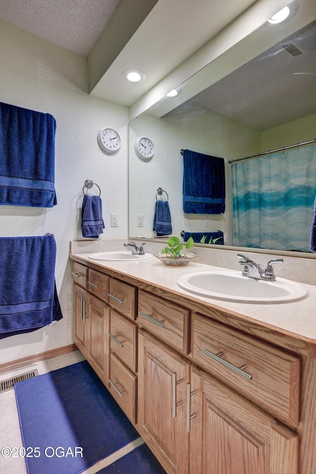 1501 Ryan Rd, Joplin, MO 64801 - full bathroom featuring double vanity and recessed lighting
