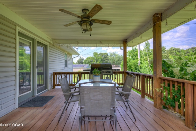 1501 Ryan Rd, Joplin, MO 64801 - wooden terrace with a ceiling fan, outdoor dining area, and area for grilling