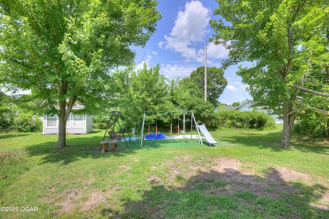 1501 Ryan Rd, Joplin, MO 64801 - view of grassy yard featuring a playground