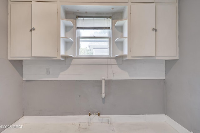 119 S Moffet Ave, Joplin, MO 64801 - kitchen featuring open shelves and baseboards