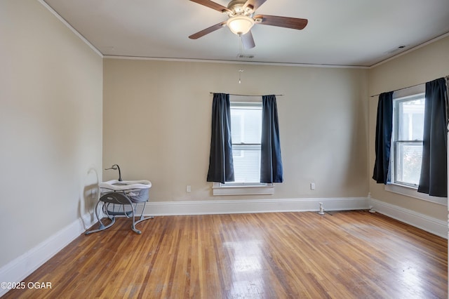 119 S Moffet Ave, Joplin, MO 64801 - unfurnished room featuring wood finished floors, crown molding, and ceiling fan
