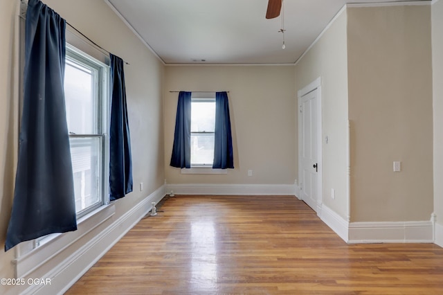 119 S Moffet Ave, Joplin, MO 64801 - empty room with light wood-style flooring, ornamental molding, and ceiling fan