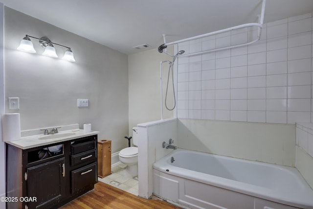 119 S Moffet Ave, Joplin, MO 64801 - full bath with vanity, shower / bath combination, and wood finished floors