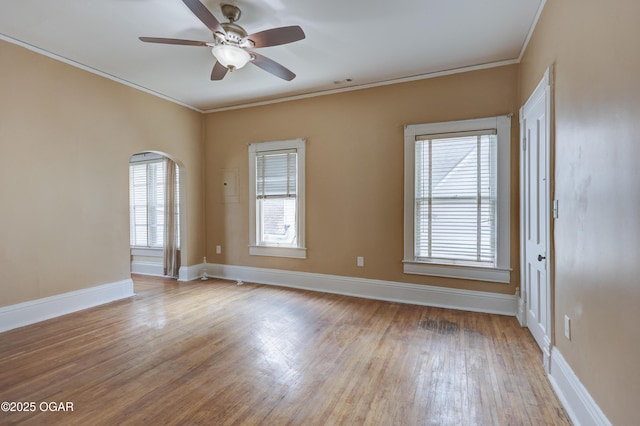 119 S Moffet Ave, Joplin, MO 64801 - unfurnished room featuring plenty of natural light, ceiling fan, wood finished floors, and ornamental molding