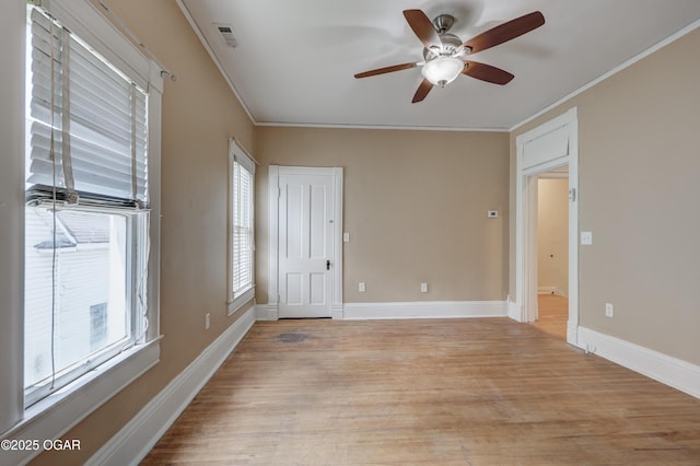 119 S Moffet Ave, Joplin, MO 64801 - unfurnished room featuring ceiling fan, light wood-type flooring, and crown molding
