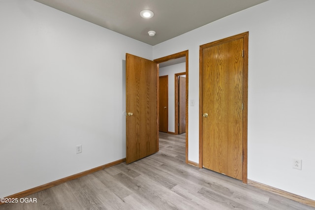 418 W Mccord St, Neosho, MO 64850 - unfurnished room featuring light wood-style floors and baseboards