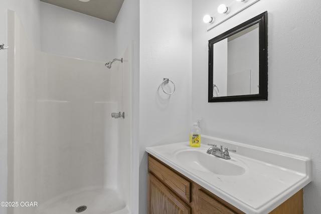 418 W Mccord St, Neosho, MO 64850 - full bathroom with a shower stall and vanity