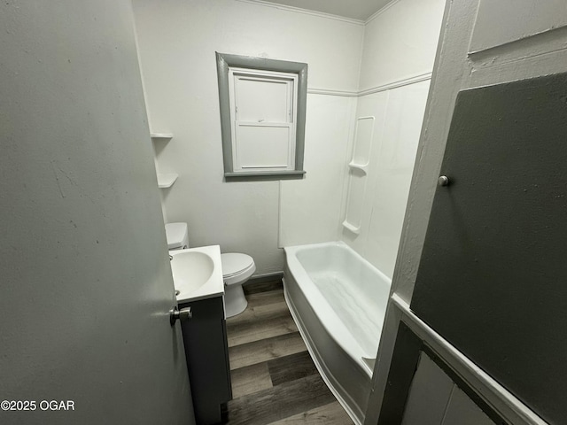 1003 Orchard St, Carthage, MO 64836 - bathroom with wood finished floors and vanity