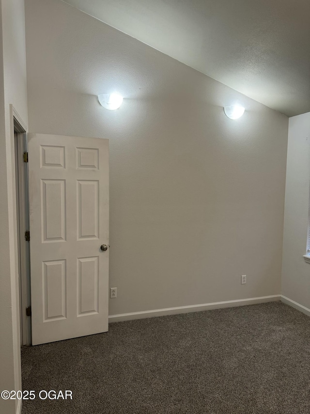 1003 Orchard St, Carthage, MO 64836 - spare room featuring dark colored carpet