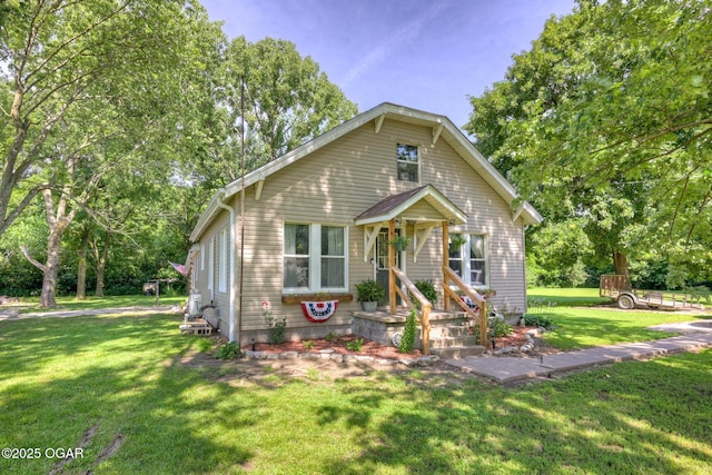 605 SE 10th Ln, Lamar, MO 64759 - bungalow with a front yard