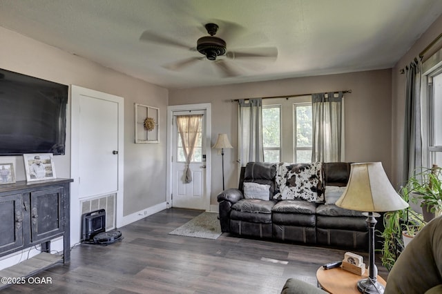 605 SE 10th Ln, Lamar, MO 64759 - living room with ceiling fan and dark wood finished floors