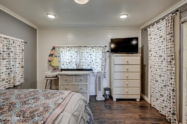605 SE 10th Ln, Lamar, MO 64759 - bedroom with crown molding, dark wood-style floors, and wood walls