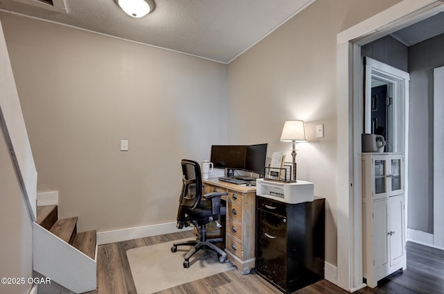 605 SE 10th Ln, Lamar, MO 64759 - office space with wood finished floors and a textured ceiling
