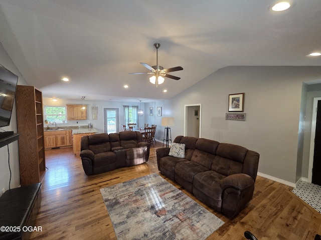 3009 S Monroe Ave, Joplin, MO 64804 - living room featuring vaulted ceiling, a ceiling fan, wood finished floors, and recessed lighting