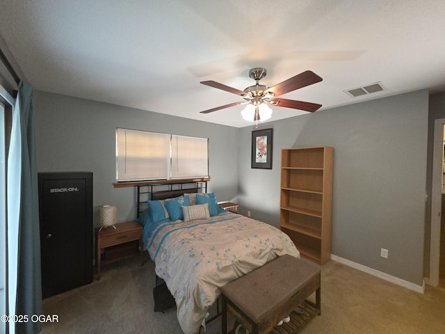 3009 S Monroe Ave, Joplin, MO 64804 - bedroom with light colored carpet and ceiling fan