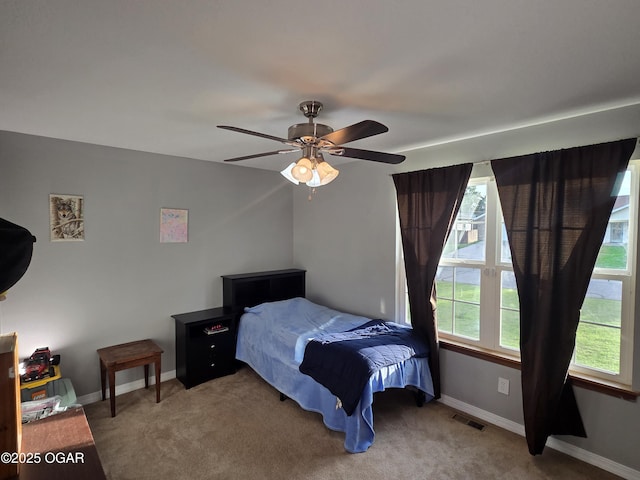 3009 S Monroe Ave, Joplin, MO 64804 - bedroom featuring carpet and ceiling fan