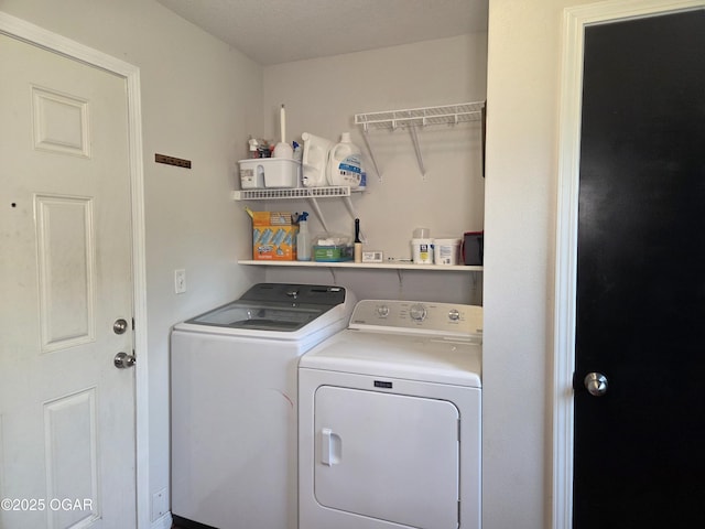 3009 S Monroe Ave, Joplin, MO 64804 - laundry room with washer and clothes dryer