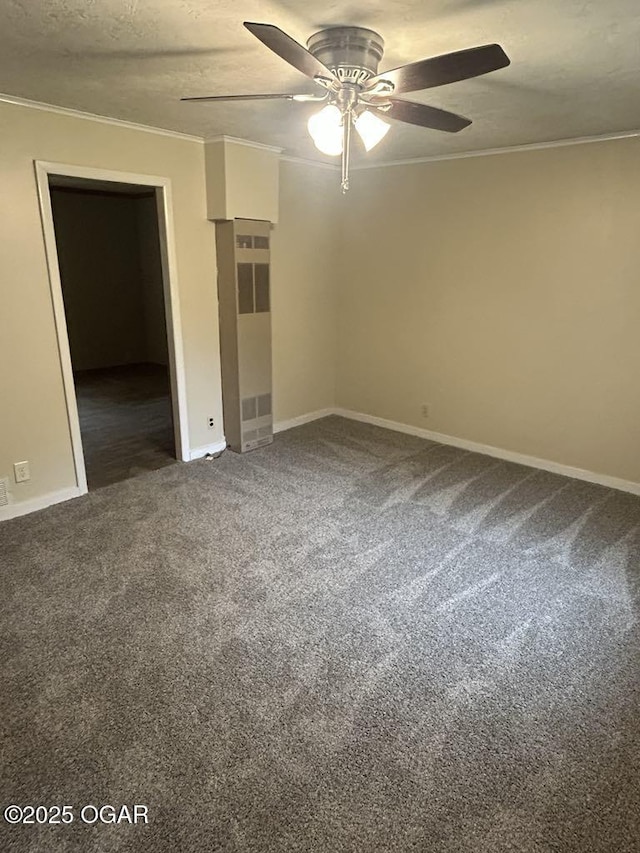 419 Depot St, Oswego, KS 67356 - carpeted empty room featuring ceiling fan and crown molding