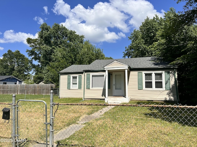 821 New Hampshire Ave, Joplin, MO 64801 - bungalow-style home featuring a gate, roof with shingles, and crawl space
