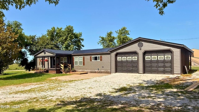 4950 SE 118th St, Galena, KS 66739 - ranch-style home featuring an attached garage, driveway, and a front yard