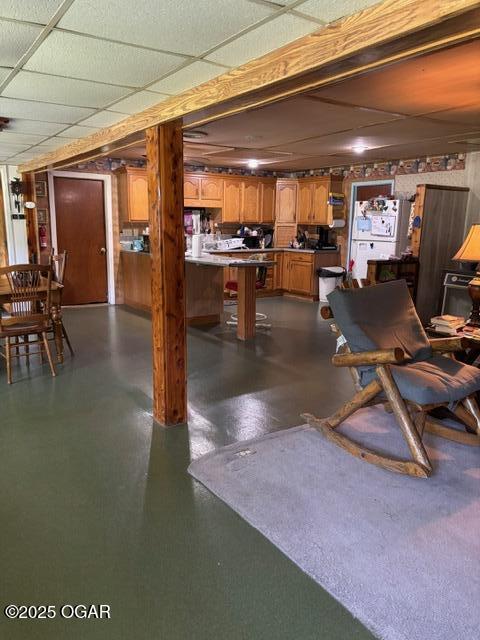 8305A Ivory Rd, Reeds, MO 64859 - below grade area featuring white fridge