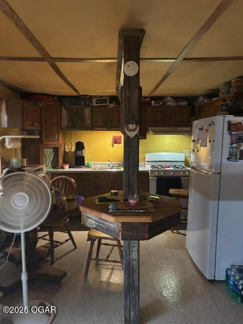 8305A Ivory Rd, Reeds, MO 64859 - basement featuring freestanding refrigerator
