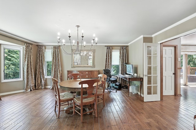 5623 Rivercrest Valley Dr, Joplin, MO 64804 - dining room with crown molding, a chandelier, hardwood / wood-style flooring, and french doors