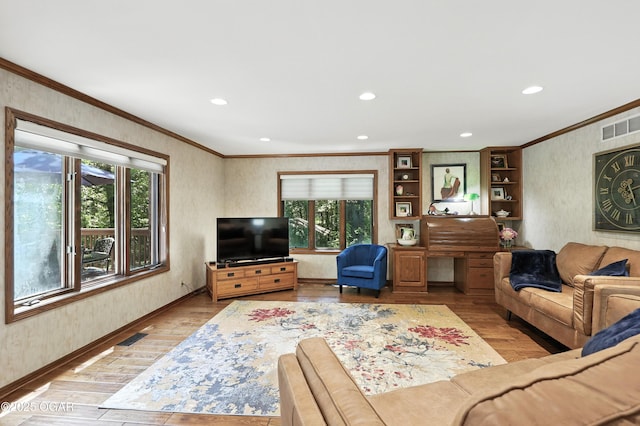 5623 Rivercrest Valley Dr, Joplin, MO 64804 - living area featuring crown molding, plenty of natural light, wood-type flooring, recessed lighting, and wallpapered walls