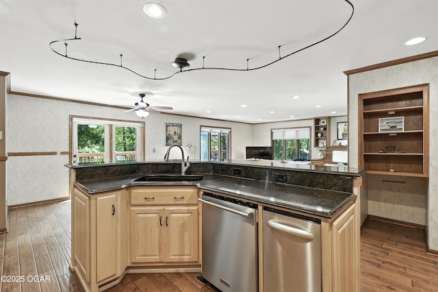 5623 Rivercrest Valley Dr, Joplin, MO 64804 - kitchen with stainless steel dishwasher, light brown cabinets, wood finished floors, ceiling fan, and open floor plan