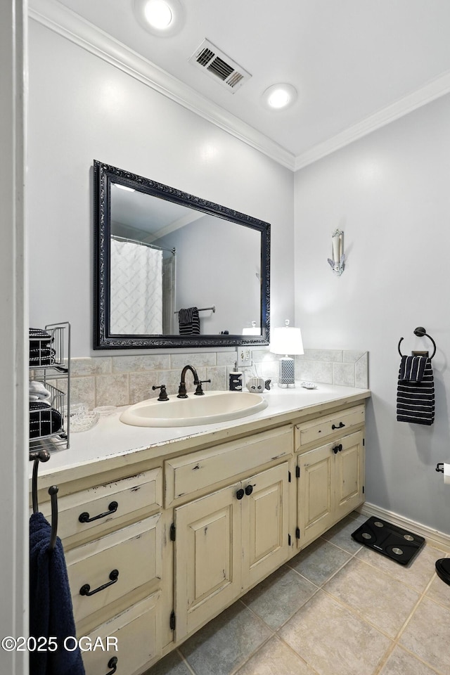 5623 Rivercrest Valley Dr, Joplin, MO 64804 - full bath with crown molding, double vanity, and tile patterned flooring