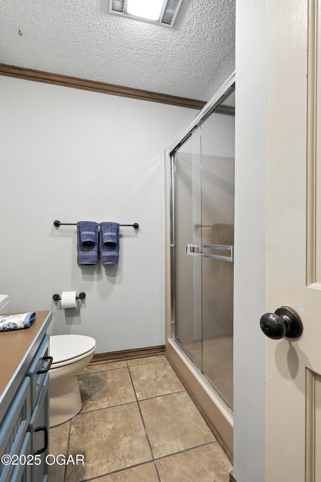 5623 Rivercrest Valley Dr, Joplin, MO 64804 - bathroom with a stall shower, vanity, a textured ceiling, ornamental molding, and tile patterned flooring